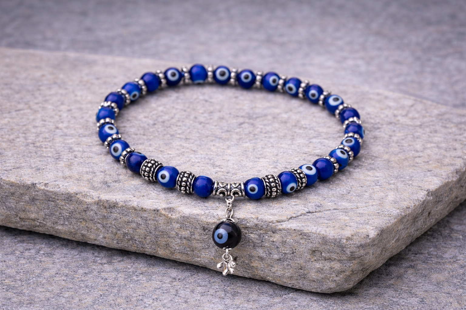Evil Eye Anklet on grey stone - Blue Nazar Protection Ankle Bracelet
