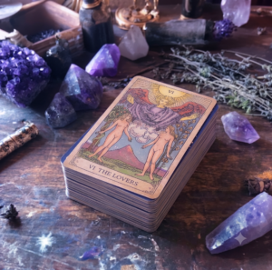stack of tarot deck with lovers card on top
